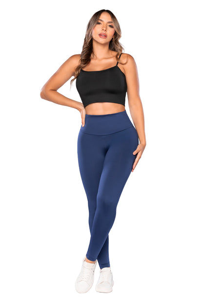 - Leggings SMI0079 ESSENTIALS con faja interna y efecto lifting
- Vista lateral con tiro alto y tecnología Ultrainvisible
- Detalle posterior con levantamiento natural y pretina moldeadora
